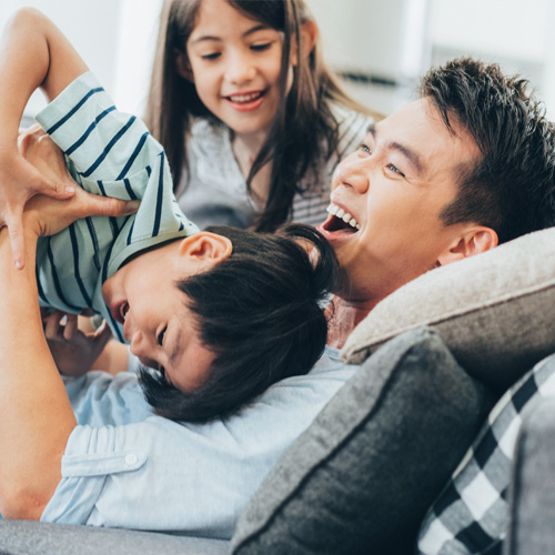 dad playing with children