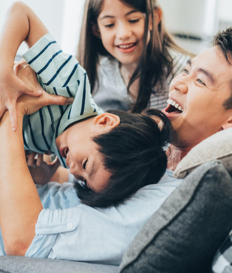 dad playing with kids