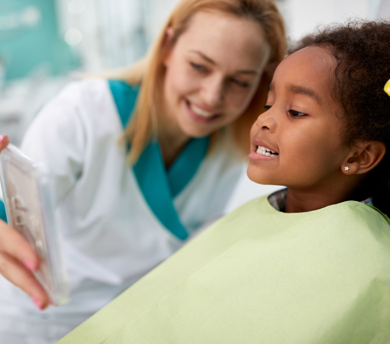 little girl at the dentist