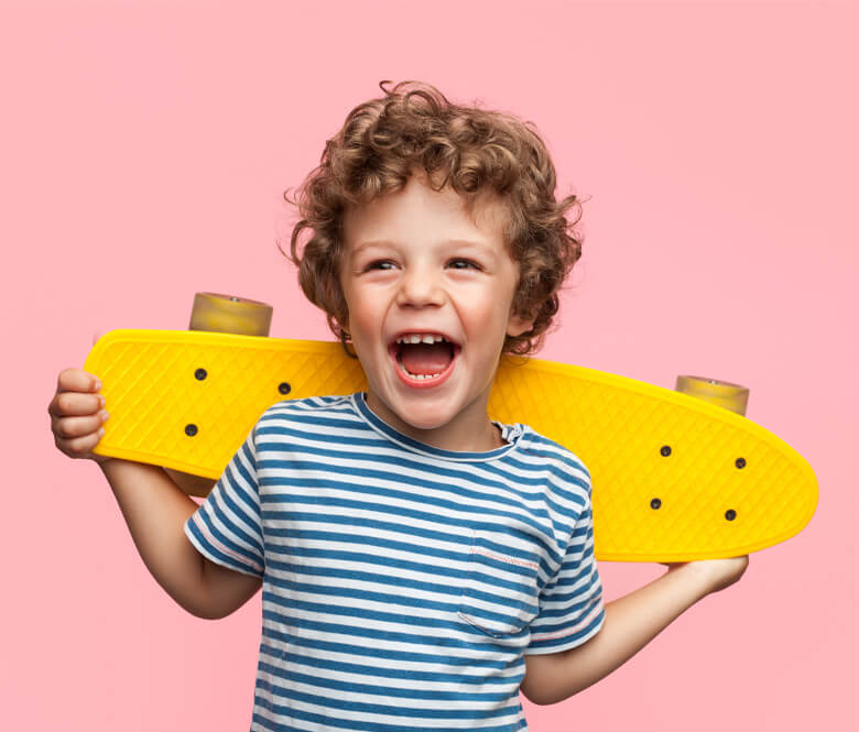 little boy with penny board skateboard