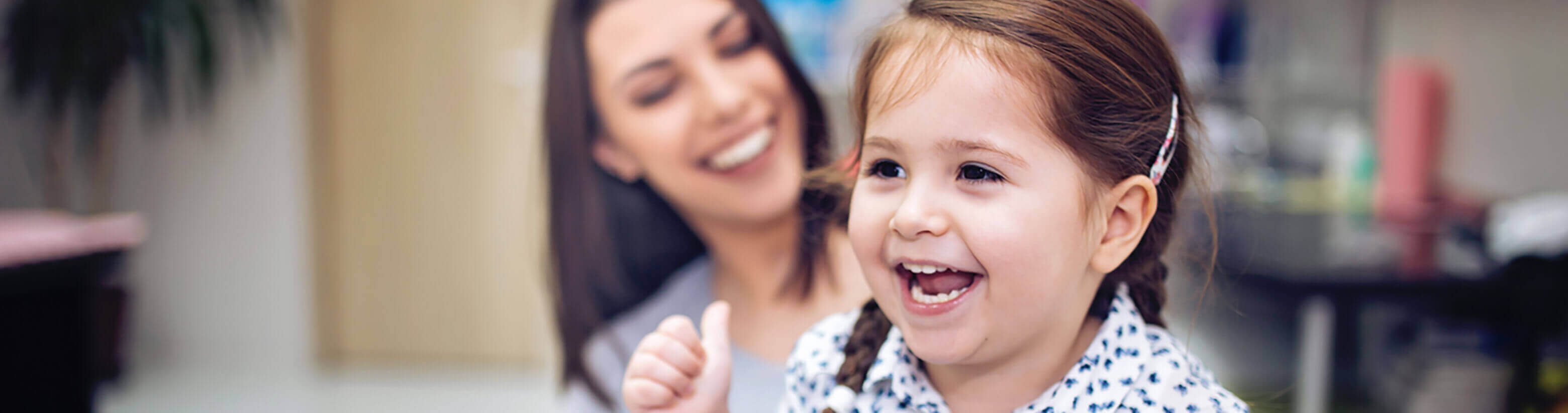 girl playing with mom