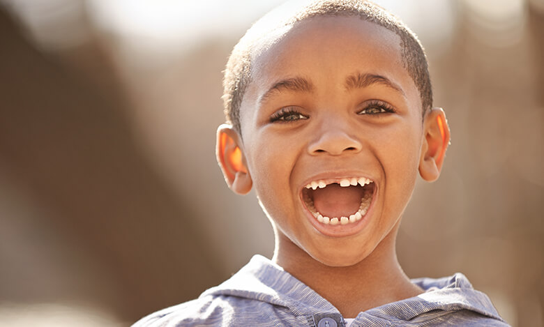 boy with missing tooth