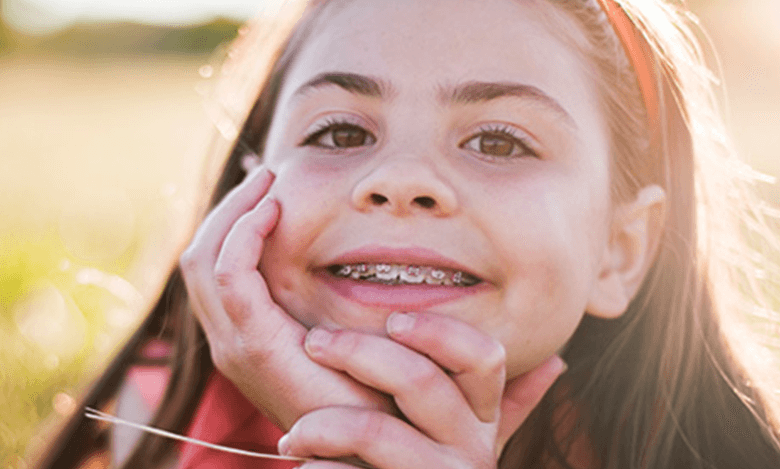 young girl with metal braces