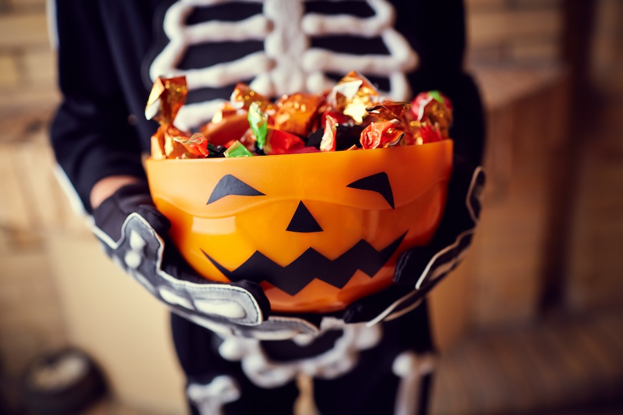 Halloween candy, prevent cavities, kids dental health, Austin Pearls Pediatric Dentistry, dentist in Austin, TX, best candy for teeth, kids oral hygiene, dental tips Halloween